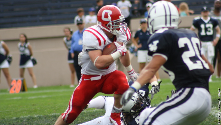 rp_primary_gellatly_yale11 Cornell running back Grant Gellatly carries the ball in a game against Yale at the Yale Bowl on Sept. 24. The Big Red fell to the Bulldogs 37-17. (Photo by Jeremy Hartigan)