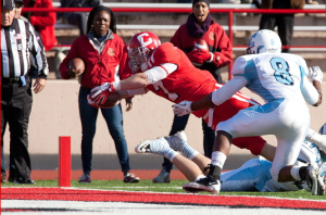 Big Red Shootout–Cornell receiver Grant Gellatly dives into the endzone for a touchdown in the first quarter in a game against Columbia Saturday afternoon at Schoellkopf Field. The Big Red’s 62-41 victory over Columbia was its highest point total since 1936. (Photo by Patrick Shanahan)